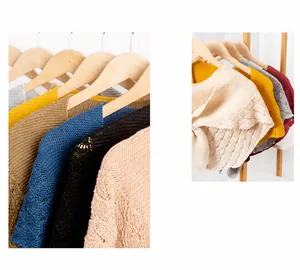 Detail of hollow-out knit shawl featuring colorful textured patterns and breathable fabric