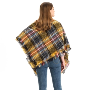 Scottish plaid shawl with yellow and black patterns and delicate fringe edges