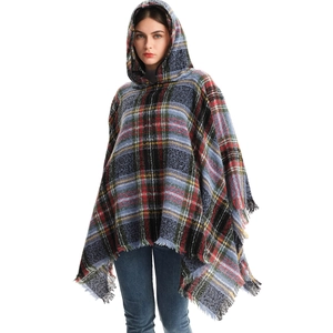 Women's hooded plaid poncho with classic tartan pattern and fringe details for autumn