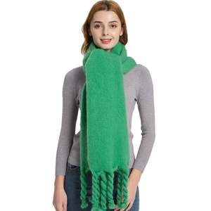 Vibrant green knit shawl scarf featuring unique chunky braided fringe on female model
