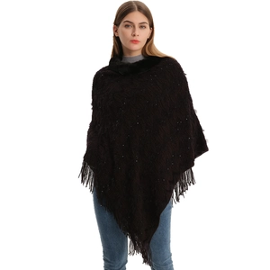 Elegant knit poncho with faux fur collar, sequins, and tassels in deep dark brown