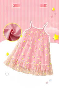 Detailed view of pink mesh summer dress with daisy print and ruffled layers for girls