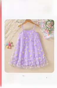 Close-up of light purple mesh fabric with white daisy floral prints on a summer dress