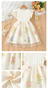 Detail of baby girl tulle dress featuring floral embroidery and ruffled flutter sleeves