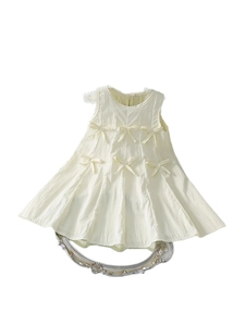 Elegant girls light yellow sleeveless A-line dress with six decorative bows for summer