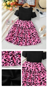 Detail of girls cold-shoulder dress with ribbed top and pink leopard tiered skirt
