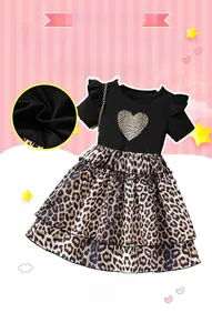 Detail of girls leopard print tiered mesh skirt with ribbed fabric and heart patch
