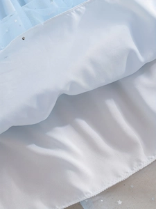Blue tulle dress for girls with star embroidery and white lining detail view