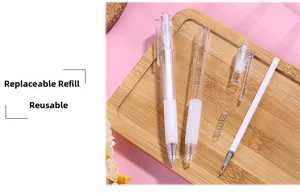 Disassembled view showing clear barrel, spring and refill of the retractable gel pen