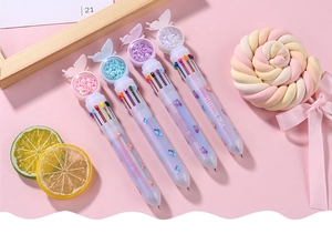 Detailed view of 10-color multi-color ballpoint pens with purple butterfly sequins topper