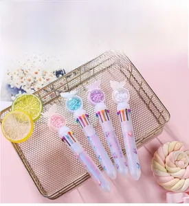 Detail of 10-color shuttle ballpoint pen with pink butterfly glitter topper and sequins