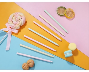 Close-up of seven 0.5mm macaron colored retractable gel pens with a needle point tip