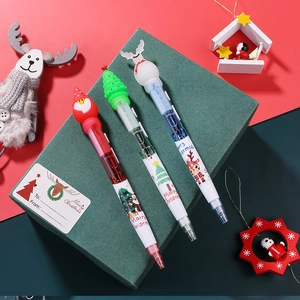 Three-piece Christmas ballpoint pen set with glowing Santa and tree in festive gift box