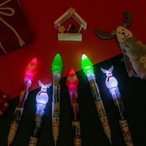 Festive Christmas ballpoint pens with LED lights featuring Santa and reindeer designs