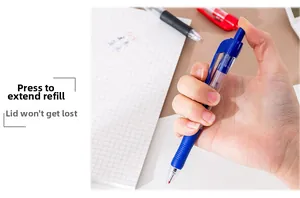 Detail of blue retractable gel pen showing the ergonomic grip and click mechanism