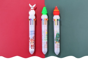 Close-up of 10-color Christmas pens with elk, tree, and Santa hat silicone toppers