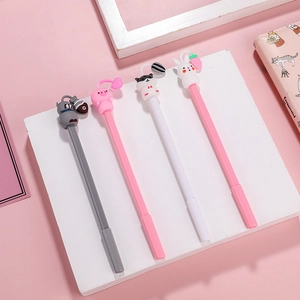 Set of four cute animal-themed neutral pens with hanging silicone charms and colorful bodies