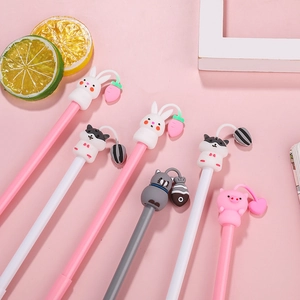 Cute cartoon animal gel pens with creative 3D ears and matching charms on pink background