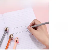 Action shot of 0.5mm squirrel gel pen writing smoothly on a lined notebook page