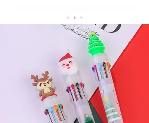 Macro detail of Christmas 10-color ballpoint pen with Santa and reindeer toppers