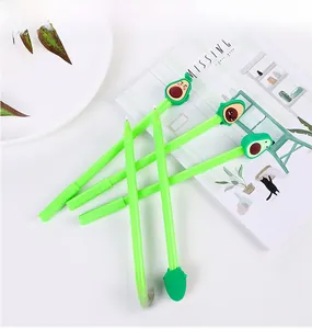 Close-up of cute avocado pens with 3D silicone pendants and needle-tip black ink nibs