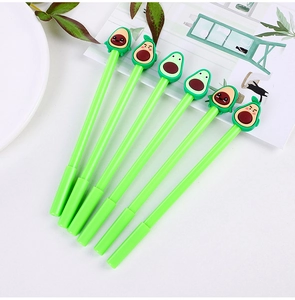 Close-up of 6-piece avocado cartoon gel pens with cute expressions on a white desk