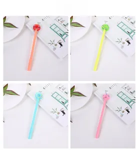 Ensemble de stylos neutres créatifs en forme de donut en orange, jaune, bleu et rose