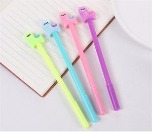 Detailed view of four colorful alpaca gel pens arranged neatly on a lined notebook