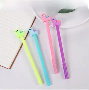 Detailed view of four alpaca-topped pens in green, blue, pink, and purple colors