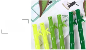 Detail of green bamboo shaped gel pens with realistic textures and leaf accents