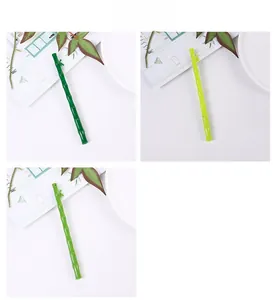 Detail showing creative bamboo shaped gel pens in three distinct shades of green