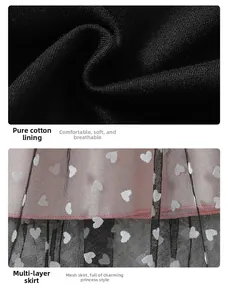 Detail of soft black cotton lining and multi-layer mesh tulle with white heart prints