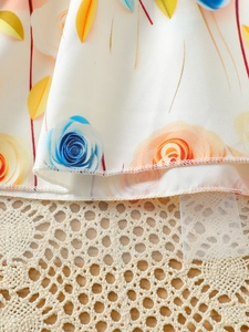 Girl's summer floral sleeveless dress with blue orange roses and layered tulle hem