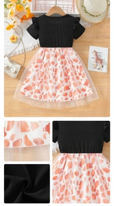 Detail of girls' dress featuring black ribbed bodice, flutter sleeves and leopard mesh skirt