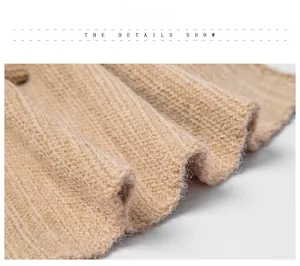 Detailed macro view showing the soft ribbed knit texture of a warm beige winter scarf