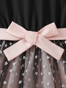 Girls short sleeve dress with pink mesh tutu skirt and large bow waist detail