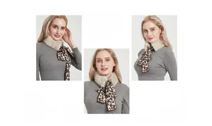 Detail of leopard print scarf with soft beige faux fur collar shown on a model