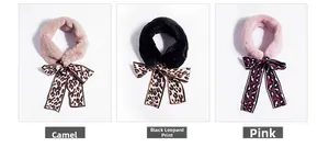 Close-up of faux fur neck warmer showing leopard print satin bow and soft texture