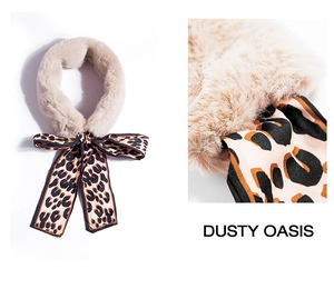 Detail of beige faux fur scarf featuring a leopard print silk ribbon and soft texture