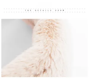 Detail shot of the soft faux rabbit fur texture on this leopard print winter scarf