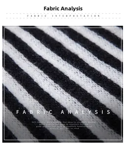 Macro shot of soft black and white striped knit fabric texture with fluffy finish