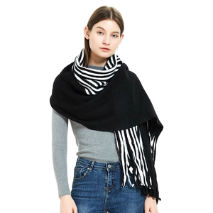 Classic black and white striped knitted scarf with fringe, perfect for autumn winter