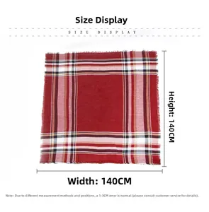 Detailed view of red plaid shawl with short fringe and 140x140cm size dimensions