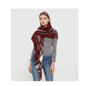 Close-up of burgundy checkered scarf shawl with fringe trim on female model