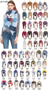 Detailed grid showing 56 color options of classic plaid scarves with fringe edges