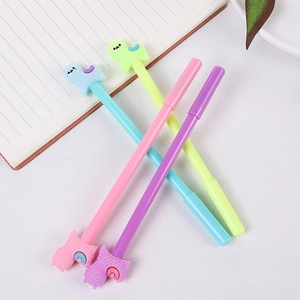 Set of four colorful cute alpaca gel pens in blue green pink and purple tones