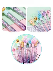 Detail of colorful liquid glitter pens with cute cat and rabbit cartoon toppers