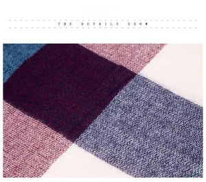 Close-up of woven fabric texture with plaid pattern in navy blue and burgundy wine red