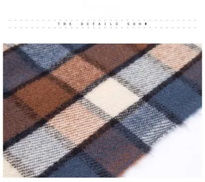 Close-up of the soft brushed fabric texture and plaid pattern of the winter scarf
