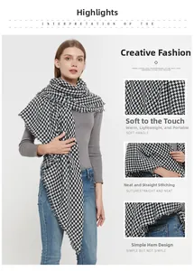 Dettaglio della sciarpa in cashmere pied-de-poule con frange e trama del tessuto